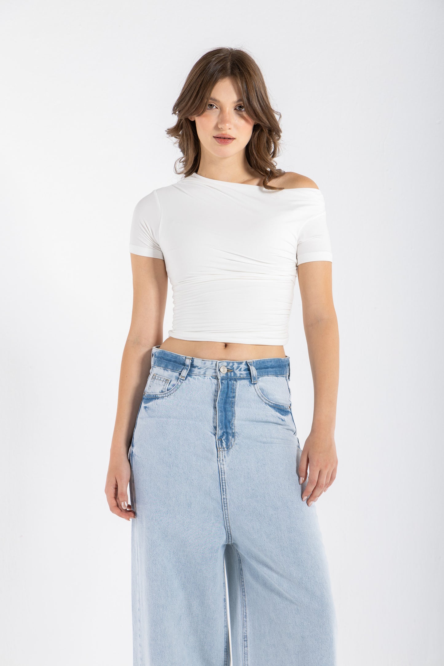 DRAPED ASYMMETRIC TOP IN WHITE