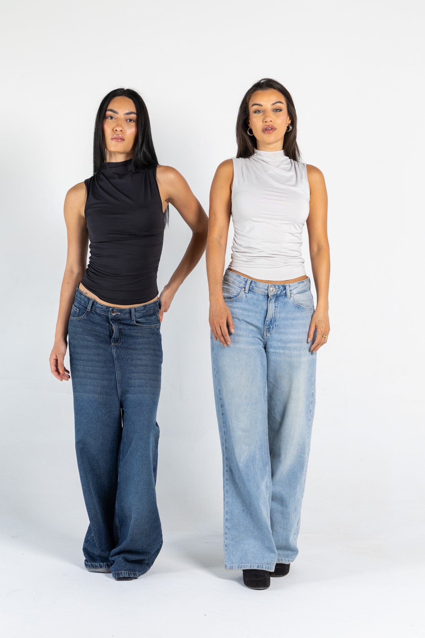 DRAPED HIGH NECK SLEEVLESS TOP IN BLACK