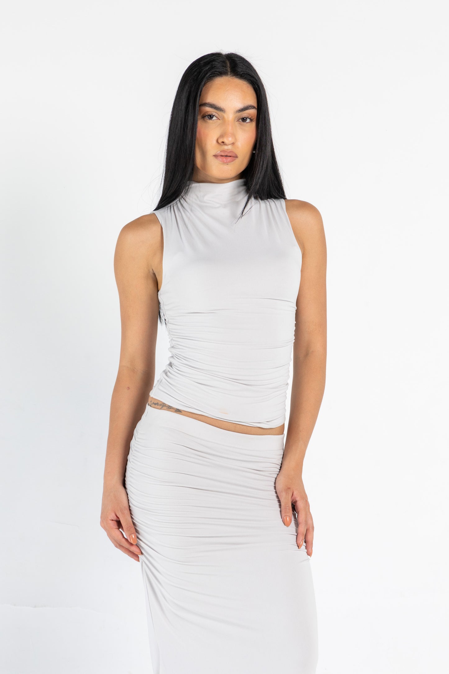 DRAPED HIGH NECK SLEEVLESS TOP IN GRIEGE