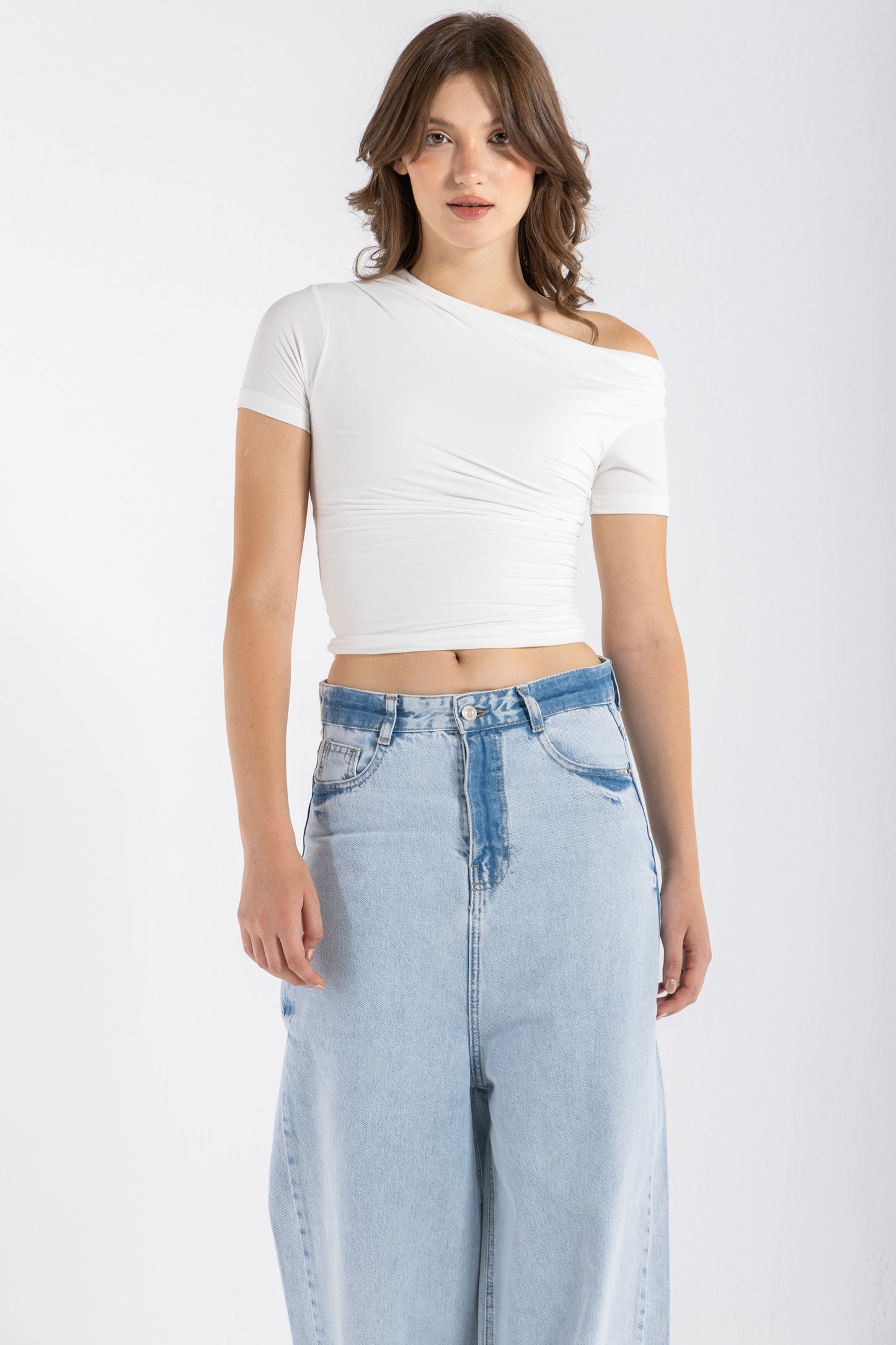 DRAPED ASYMMETRIC TOP IN WHITE