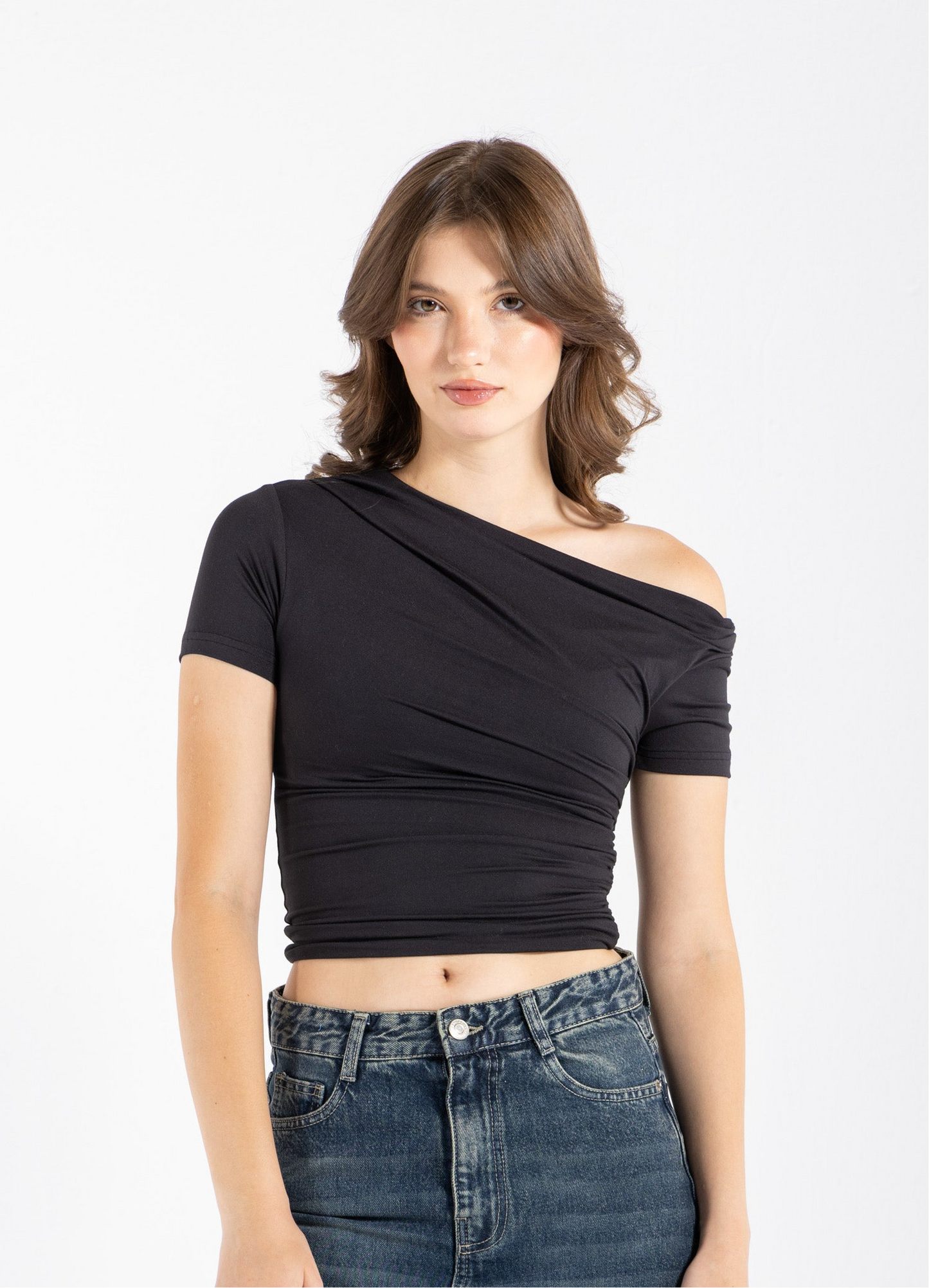 DRAPED ASYMMETRIC TOP IN BLACK