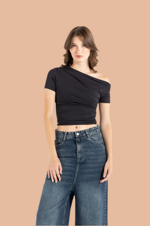 DRAPED ASYMMETRIC TOP IN BLACK